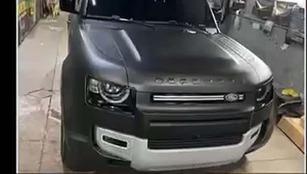 Black Land Rover Defender with fresh window tint at the GRD Creations llc shop