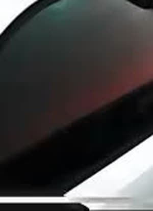 Close-up detail of precision window tint edges on a vehicle
